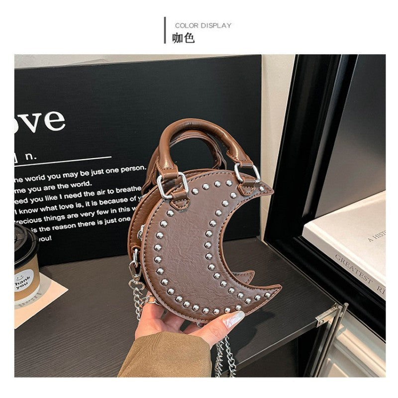 European and American punk style studded moon bag for women, niche design, fashionable chain single-shoulder cute saddle bag