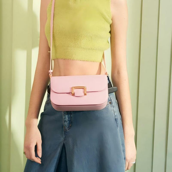 A stylish and luxurious pink crossbody bag for women