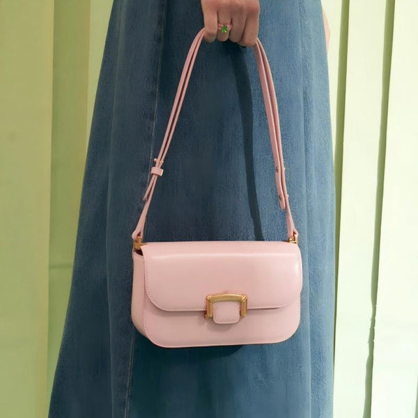 A stylish and luxurious pink crossbody bag for women