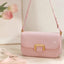 A stylish and luxurious pink crossbody bag for women
