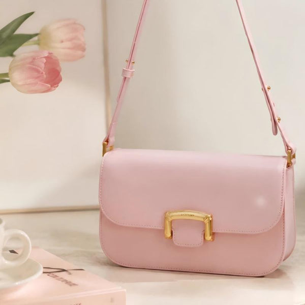 A stylish and luxurious pink crossbody bag for women