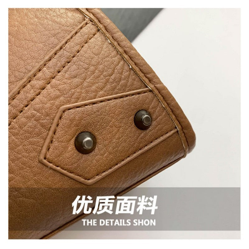 Millennium motorcycle bag punk armpit bag 2026 new handbag rivet bag cross street shoulder bag